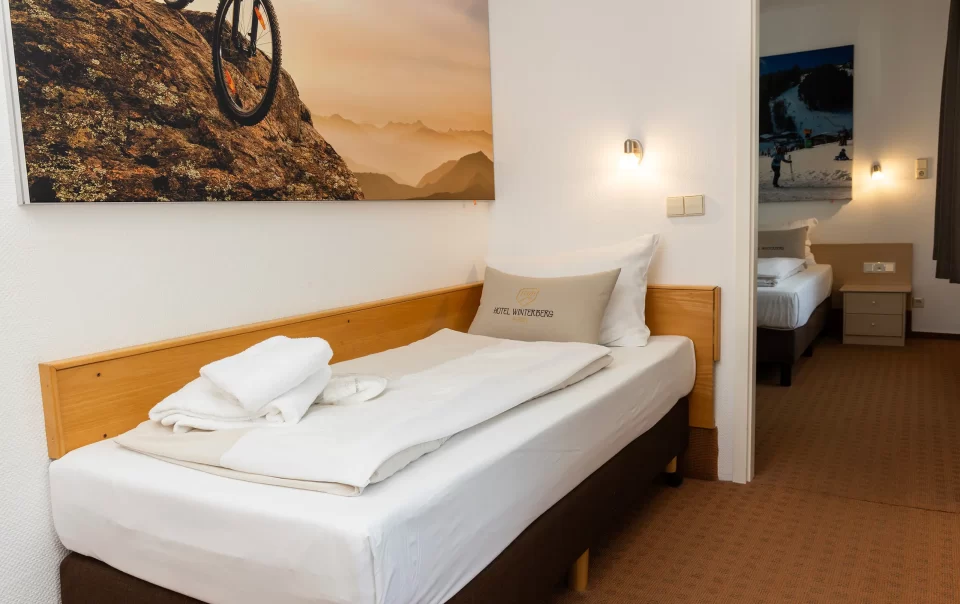 Single bed beside the window