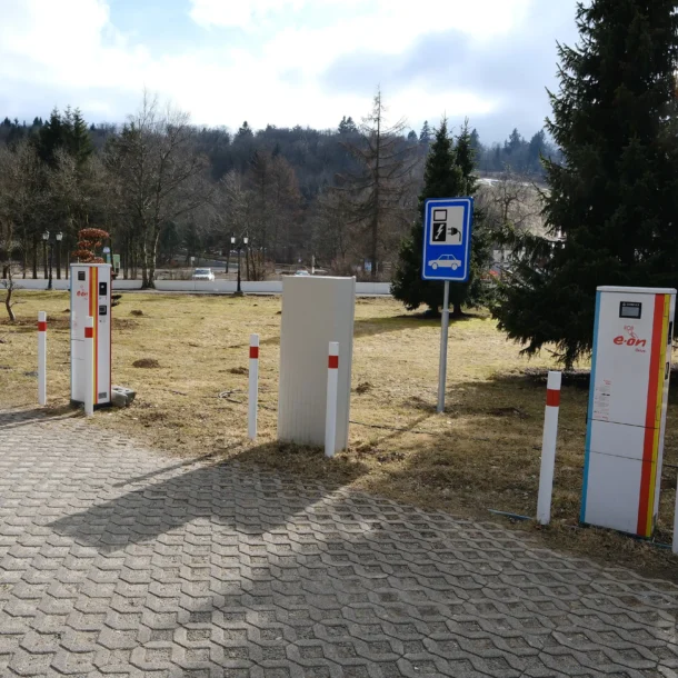 Electric vehicle charging points beside the parking area
