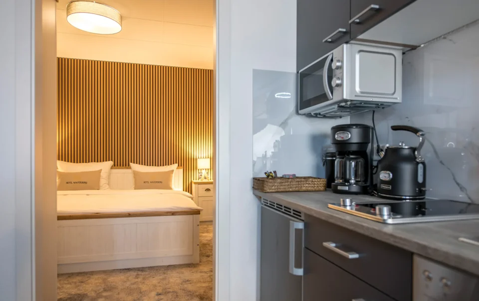 Kitchenette beside the bedroom doorway