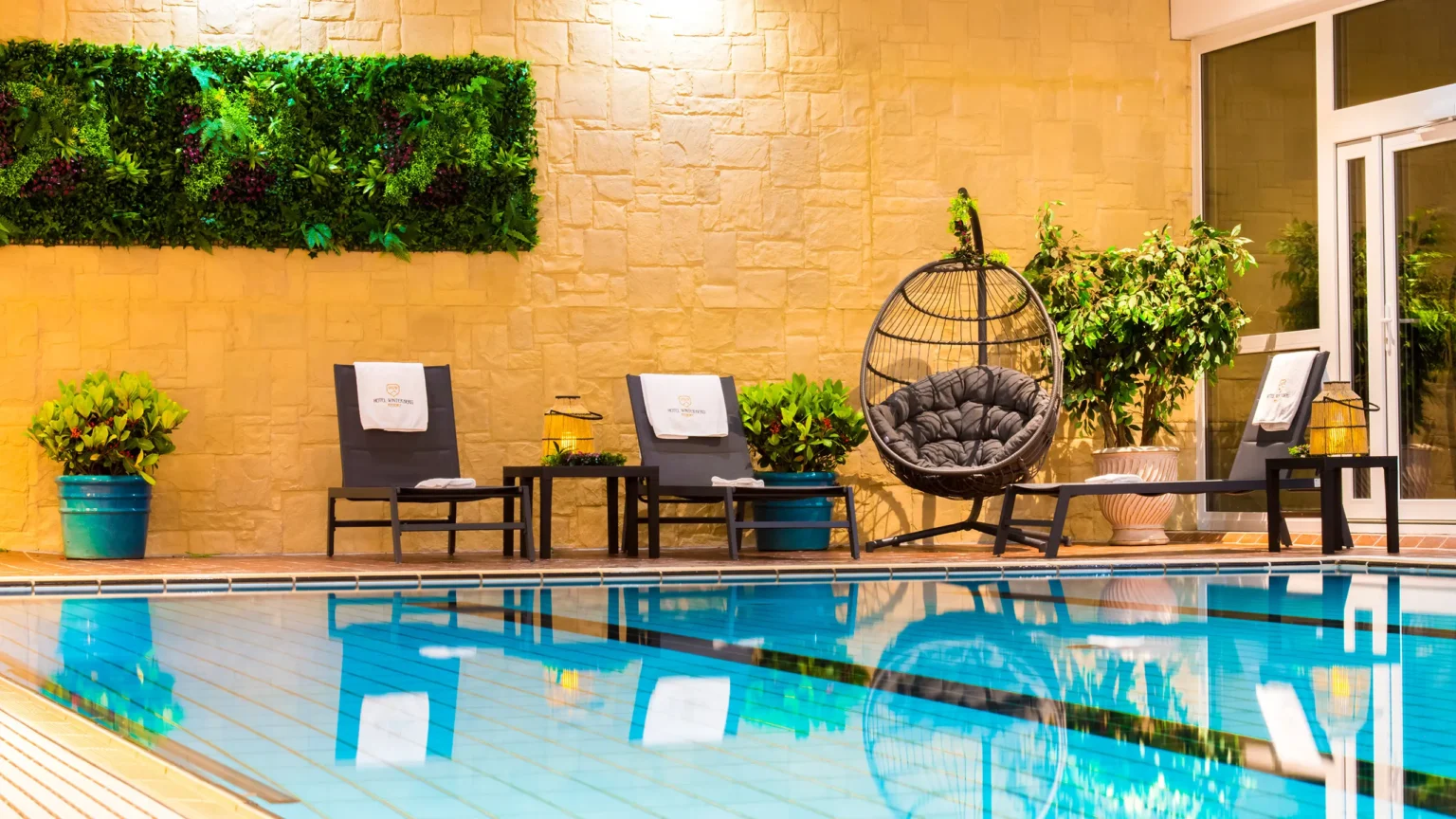 Poolside relaxation area at Hotel Winterberg Resort