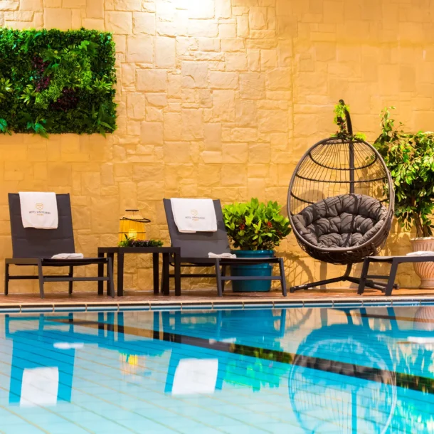 Poolside relaxation area at Hotel Winterberg Resort
